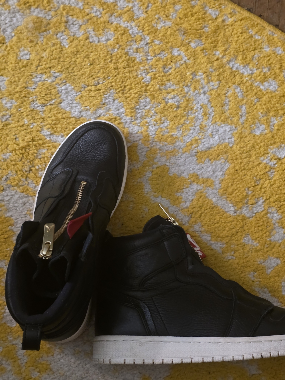 Nike Black High-Top Sneakers with Gold Zipper Accent